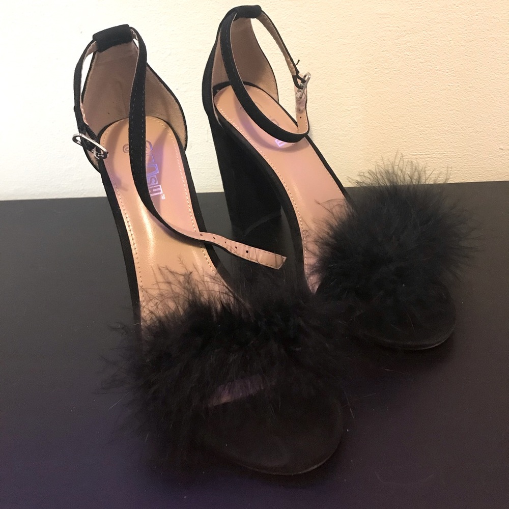 Black heels with feathers